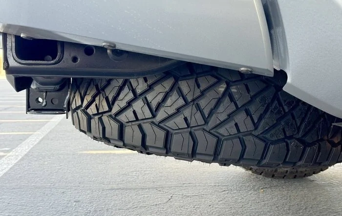 Biggest / largest spare tire size that fits is 33" inch tire (33's)