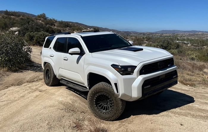 TRD Sport Premium Wind Chill Pearl Build: OTT Tune, King Shocks, 2.5" lift kit w/ sway bar links, Arena Trophy Wheels, Wildpeak 285/70/17 AT4W + more