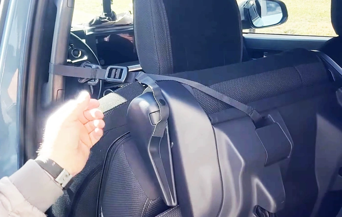 How to secure folded second row rear seats from moving / rocking -- using straps & covers [video demonstration]