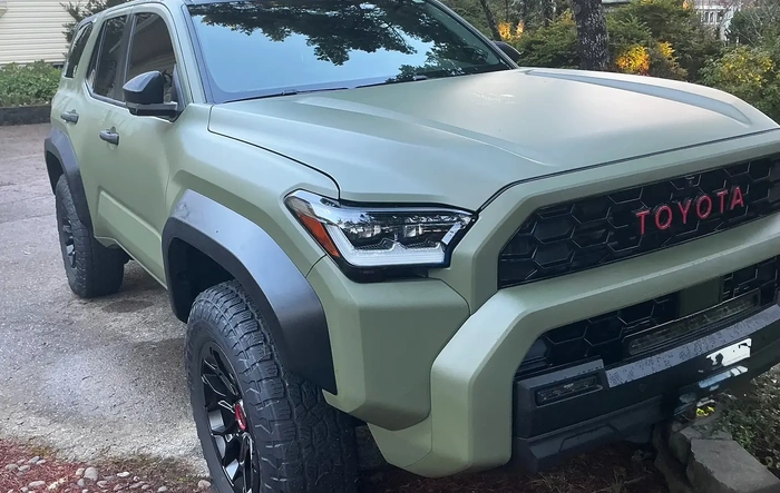 Frank the Tank TRD Pro build - RCI rock sliders, NYTOP recovery points, roof rails removed, Matte Military Green wrap