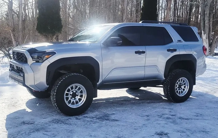 Iron Man 3" lift kit, Raceline 958mc 17x8.5 +0 offset, 285/70/17, ARK mudflaps and crash bracket delete