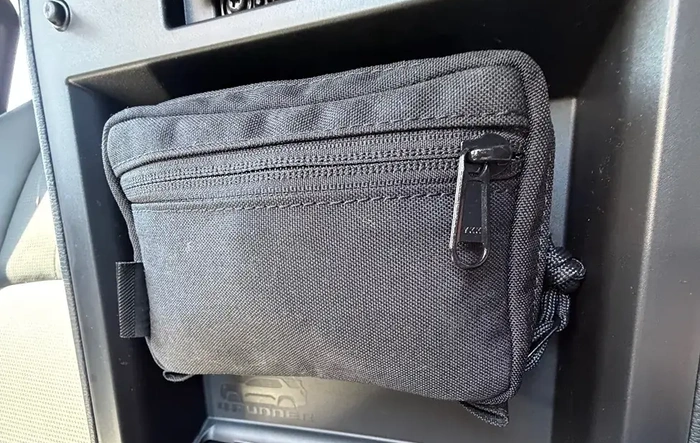My Favorite Interior Mod: EDC Pouch attached to underside of center console arm rest